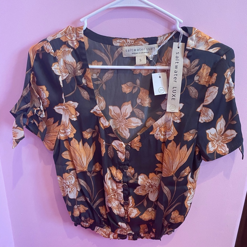 This a a brand new cute blouse by saltwater luxe.